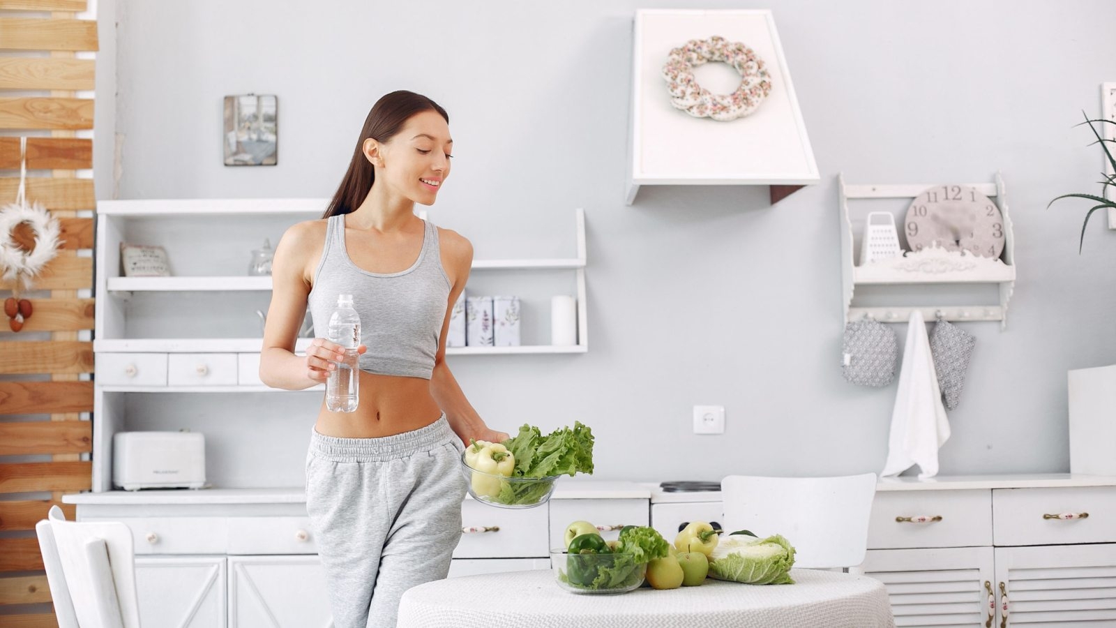 Healthy eating. Dieting and people concept. Brunette with a vegetable.