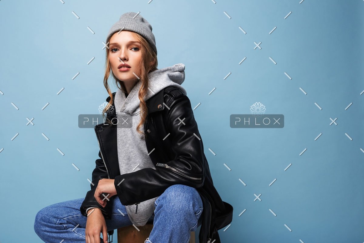 demo-attachment-404-young-beautiful-woman-with-wavy-hair-in-gray-hat-W8LUZM3